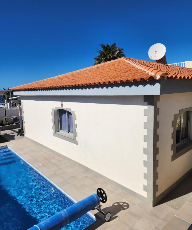 Villa Sunrise with heated pool.